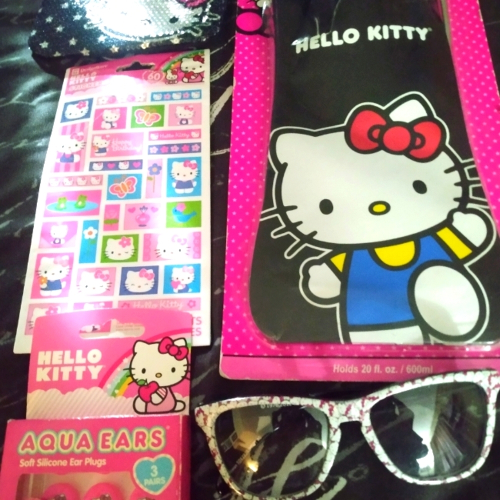 Hello Kitty coin/make up purse,foldable water bottle,glasses, stickers